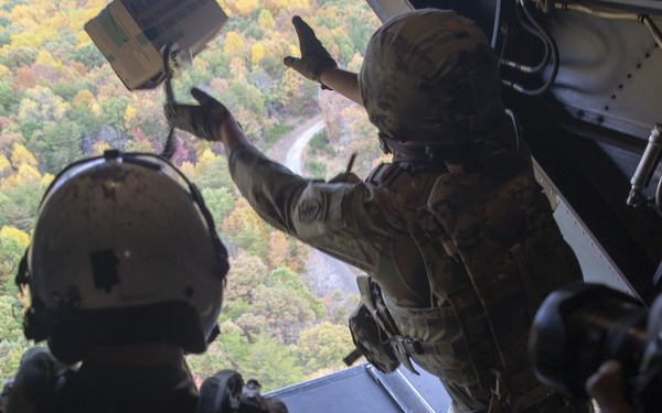U.S. Army Soldiers Drops Leaflets Off U.S. Marine Corps MV-22B Osprey