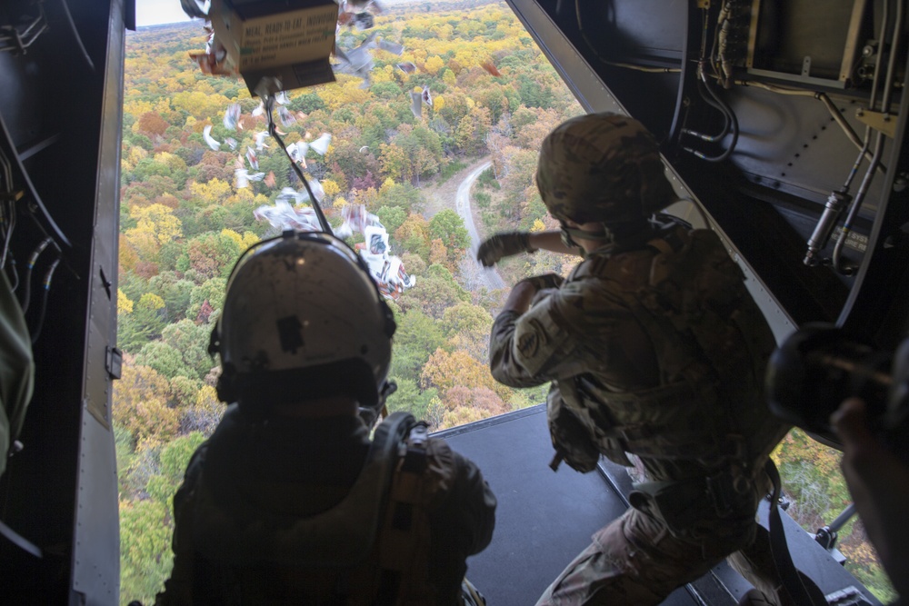 U.S. Army Soldiers Drops Leaflets Off U.S. Marine Corps MV-22B Osprey