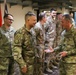 Air Force Chief of Staff General David Goldfein present coins of excellence to deployed troops in Iraq