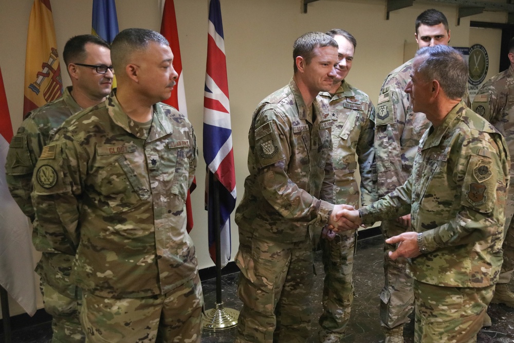 Air Force Chief of Staff General David Goldfein present coins of excellence to deployed troops in Iraq