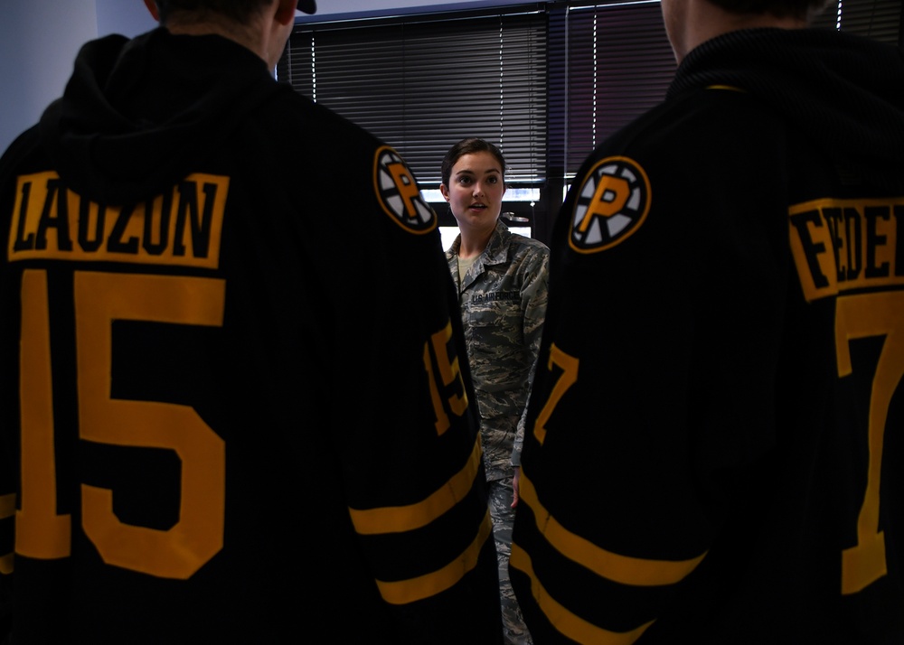 Providence Bruins Players Visit 143d Airlift Wing Ahead of Veterans Day