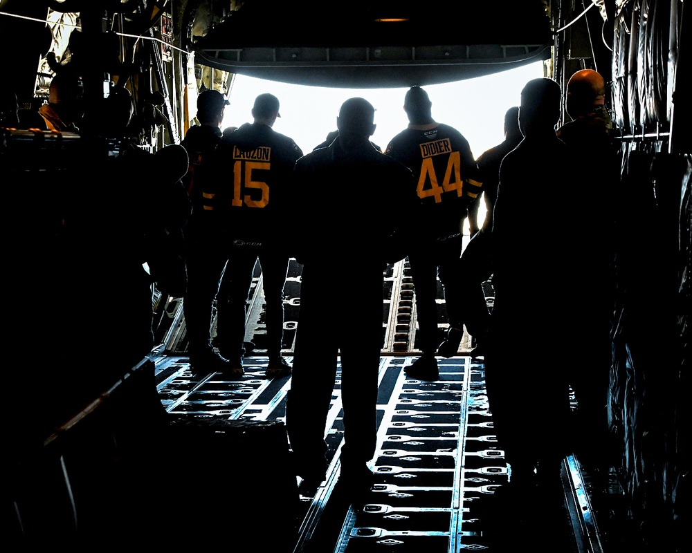 Providence Bruins Players Visit 143d Airlift Wing Ahead of Veterans Day