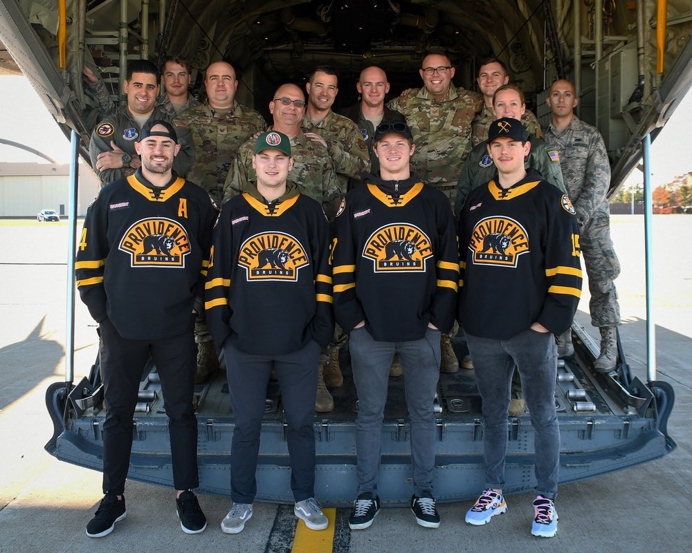 Providence Bruins Players Visit 143d Airlift Wing Ahead of Veterans Day