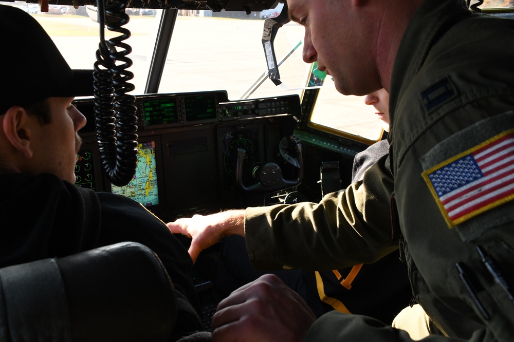 Providence Bruins Players Visit 143d Airlift Wing Ahead of Veterans Day