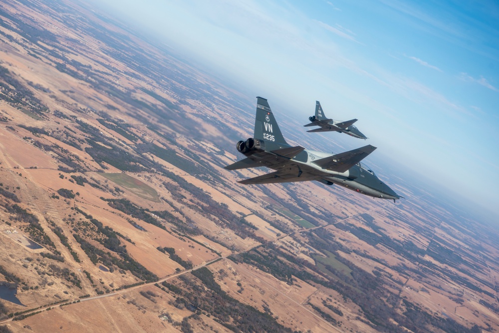 Vance AFB Performs Flyover For OSU Football Game