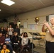 U.S. Naval Forces Europe Band’s MU1 David Koelz leads a masterclass for students at Naval Support Site’s High School.