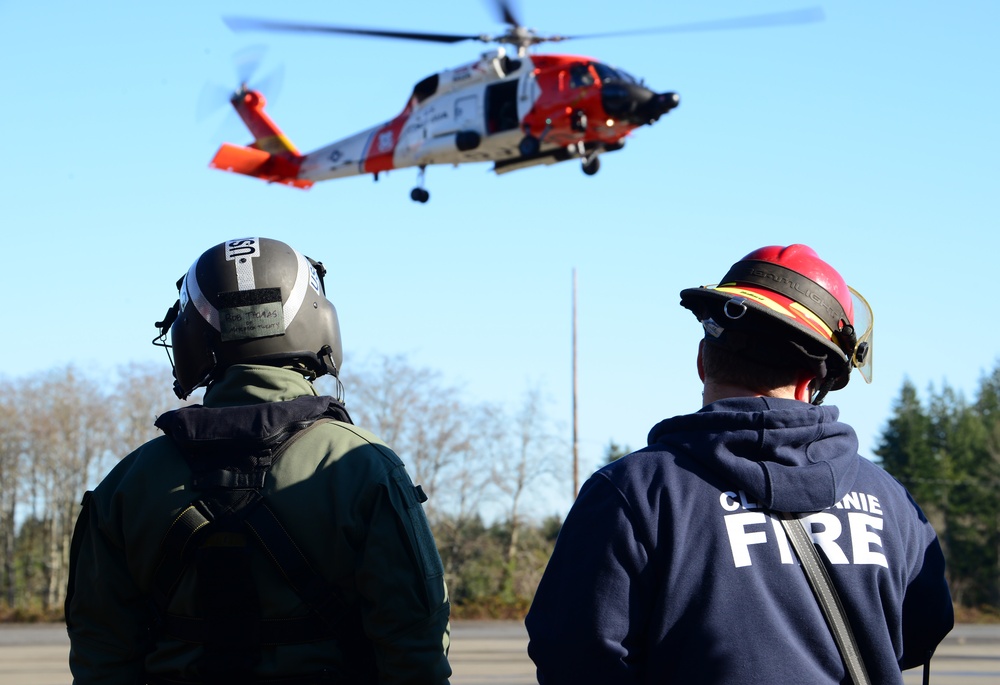 Coast Guard aircrew trains with Clatskanie Fire and Rescue