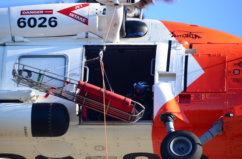 Coast Guard aircrew trains with Clatskanie Fire and Rescue