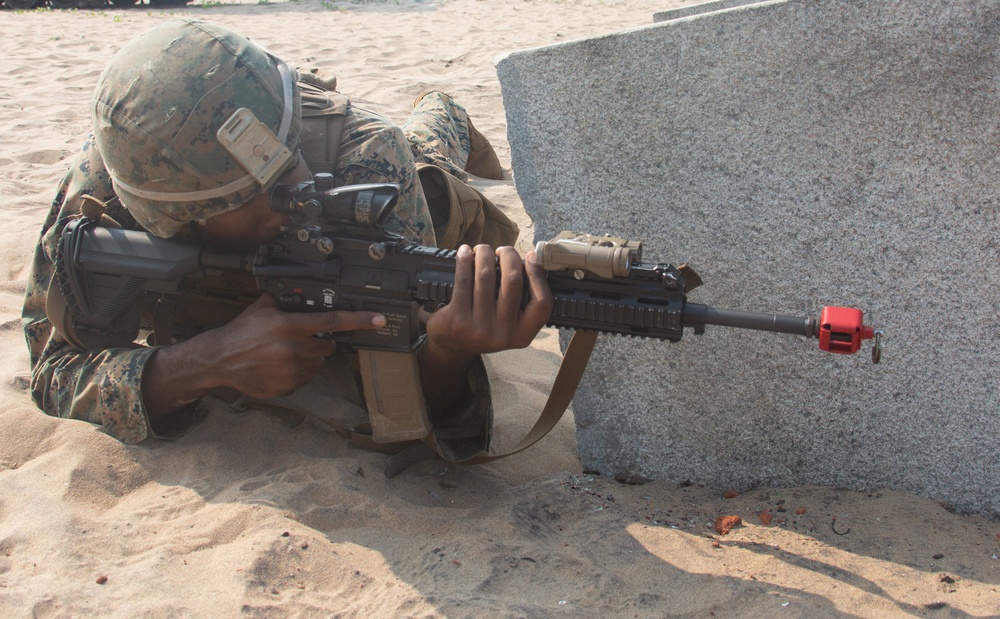 U.S. Marine Cpl. Damar Matthews posts security during exercise Tiger TRIUMPH