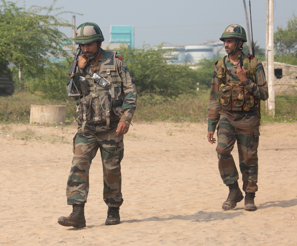 Indian Army Soldiers conduct security patrol during exercise Tiger TRIUMPH