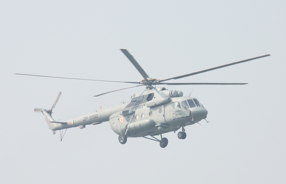 An Indian Navy UH-3H Sea King Helicopter flies overhead during exercise Tiger TRIUMPH