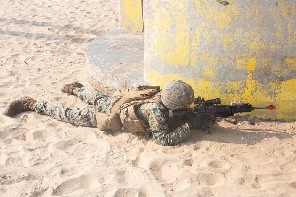 U.S. Marine Lance Cpl. Aaron Byrd posts security during exercise Tiger TRIUMPH