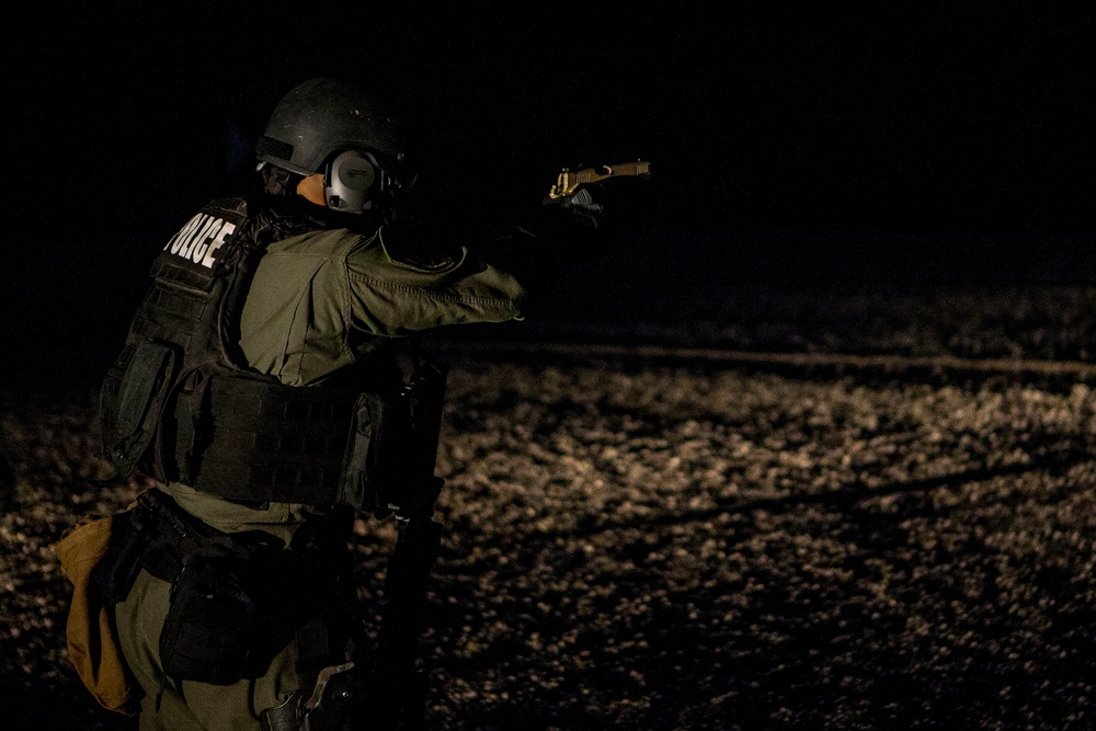 On Target: Special Reaction Team sights-in on night range