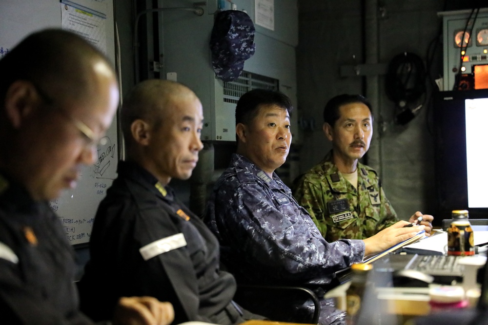 An operational debrief is held for Mine Warfare Exercise 3JA 2019
