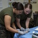 U.S. Navy Sailors Conduct Suturing Practical Application