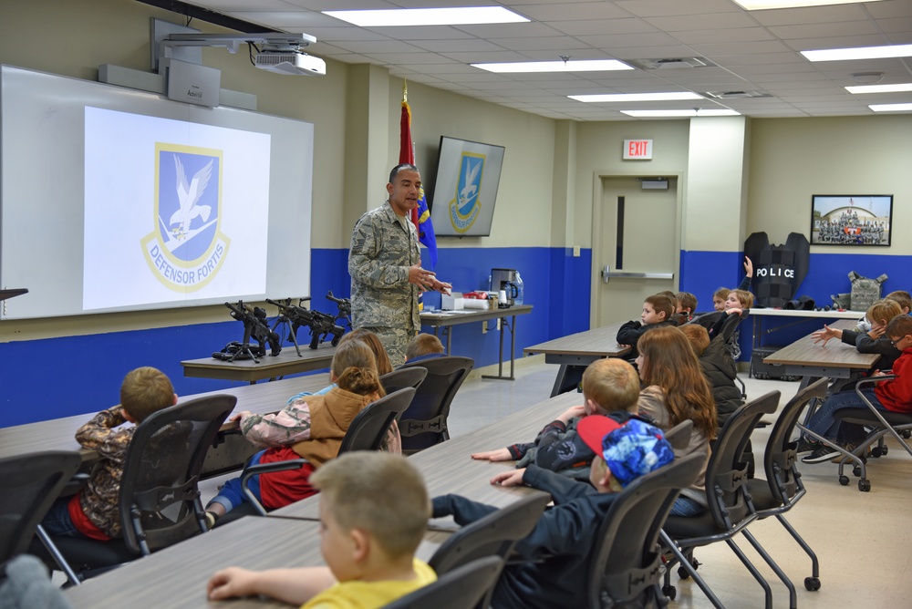 Airmen Visit with local students during base tour