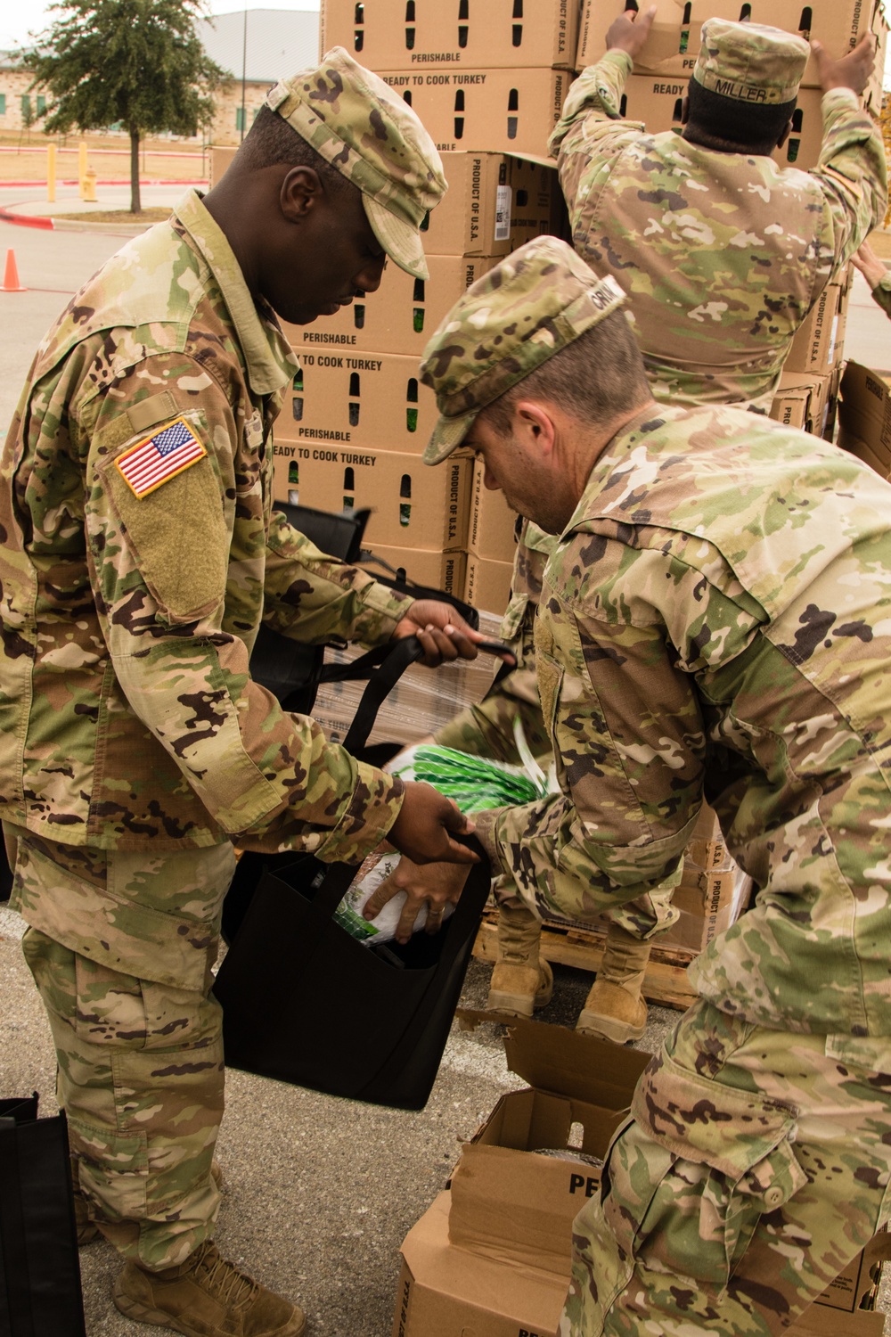 Chaplains and religious affairs specialist from Fort Hood units sort and organize holiday food baskets to be distributed to military families on Nov. 20 at Fort Hood’s Main Post Chapel.