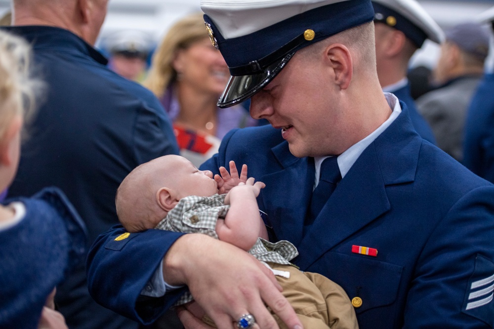 Coast Guard bootcamp graduate meets his son for the first time