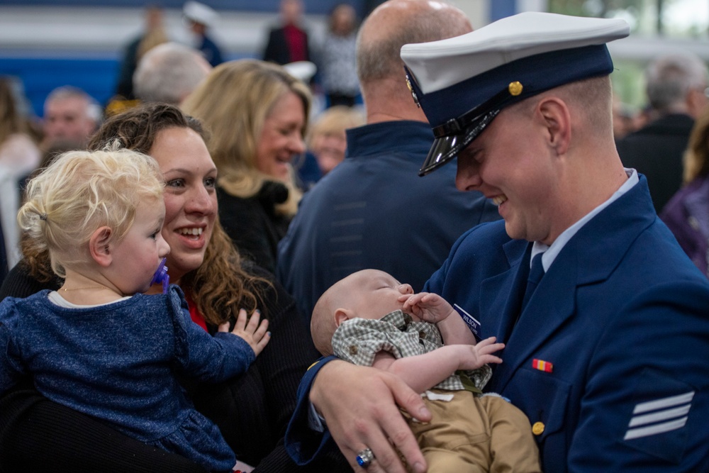 Coast Guard bootcamp graduate meets his son for the first time