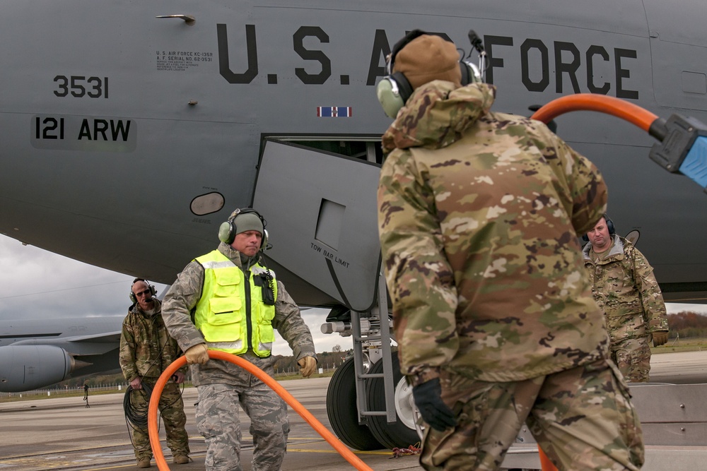 121st Maintenance and Air Crew personnel prepare for NATO aircraft refueling