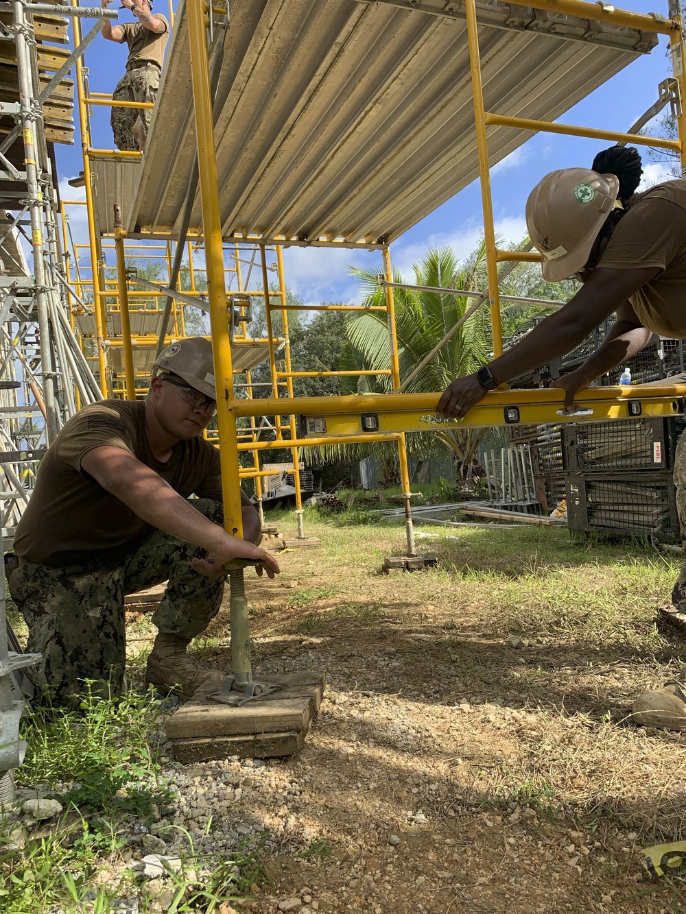 U.S. Navy Seabees deployed with NMCB-5’s Detail Tinian continue work on Explosive Ordnance Disposal Mobile Unit 5’s Boat Storage Facility