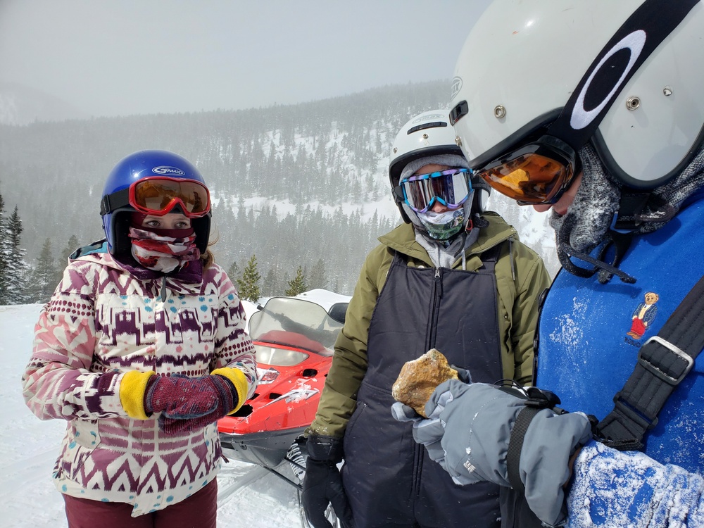 Airmen ride snowmobiles at Monarch mountain