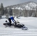 Airmen ride snowmobiles at Monarch mountain