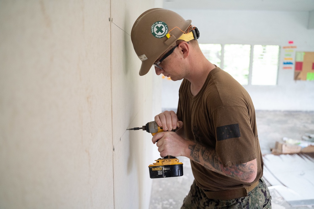 U.S. Navy Seabees deployed with NMCB-5’s Detail Pohnpei continue construction on Pehleng Elementary School