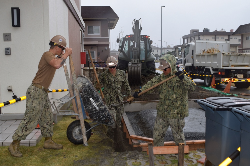 U.S. Navy Seabees deployed with NMCB-5’s Detail Iwakuni continue construction on environmental enclosures