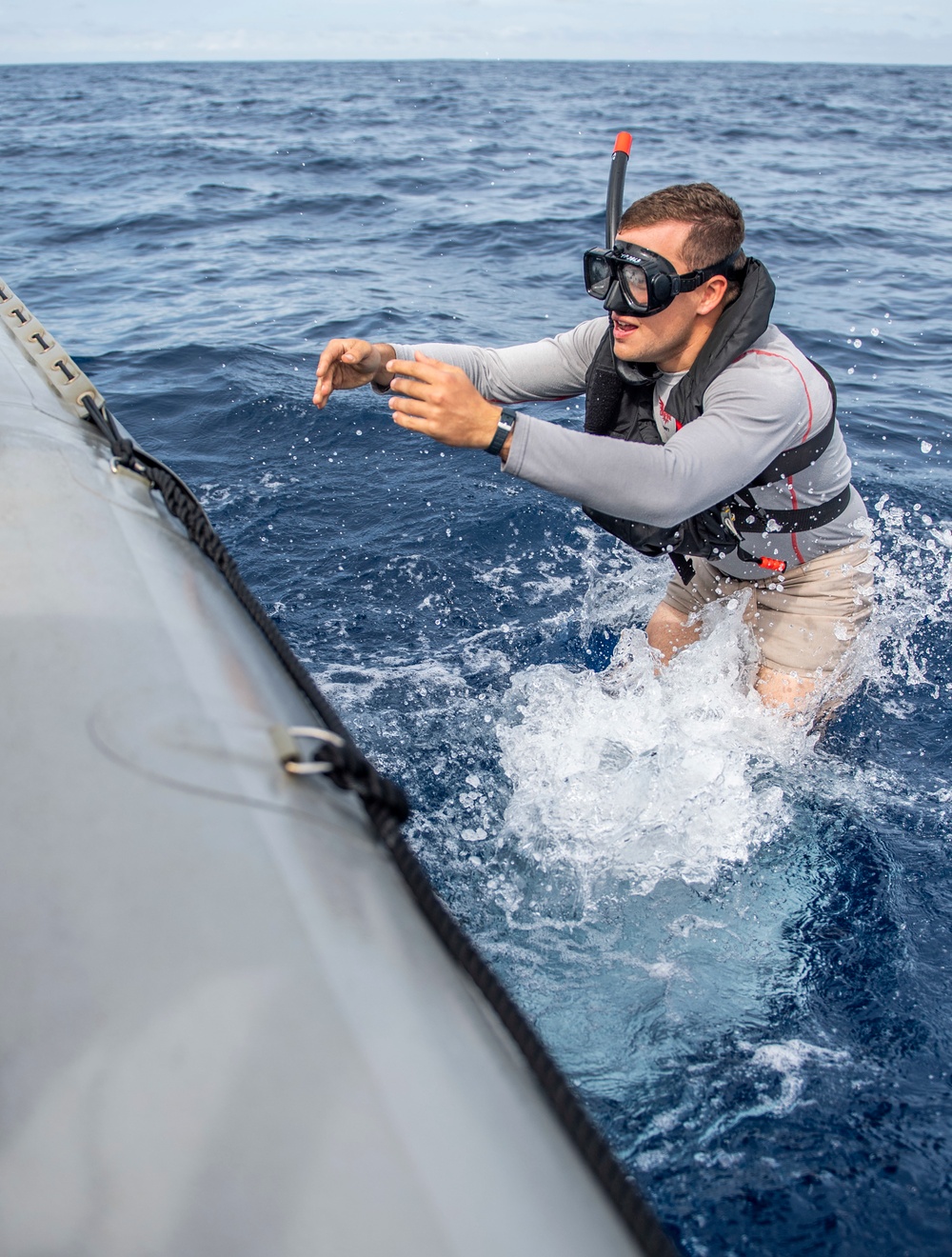 Sailors Assigned to USS Milius (DDG 69) Conduct Man-Overboard Training from RHIB