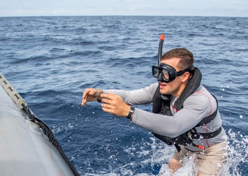 Sailors Assigned to USS Milius (DDG 69) Conduct Man-Overboard Training from RHIB