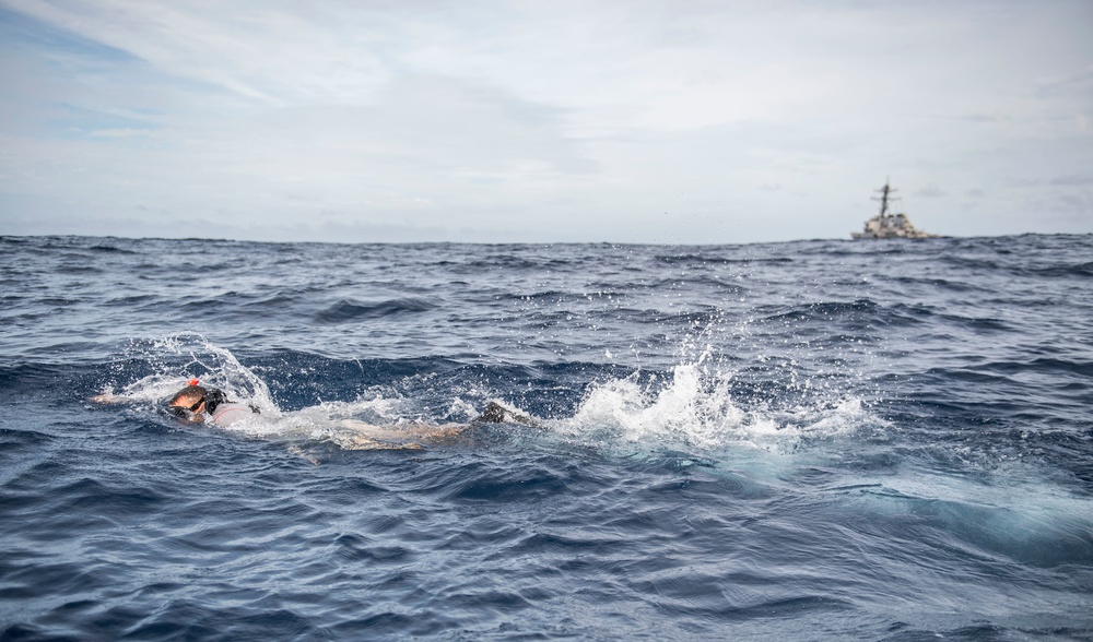 Sailors Assigned to USS Milius (DDG 69) Conduct Man-Overboard Training from RHIB