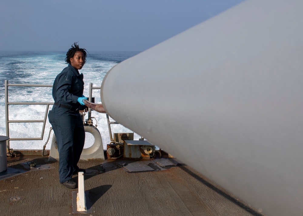 USS Normandy Sailor Cleans, Lubricates 5-Inch Gun