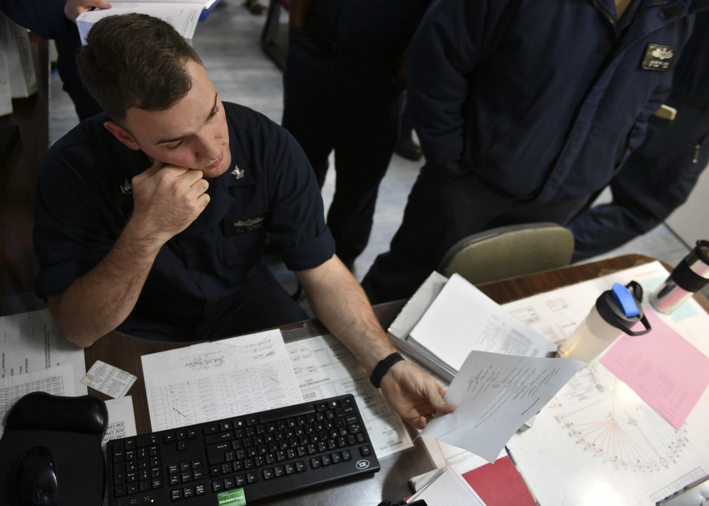 USS Normandy Sailor Stands Combat Systems Officer Of The Watch