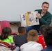 U.S. Marines and Sailors read and interact with elementary school students during Fuji Viper 20-2