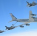 F-16 Fighting Falcons and a KC-135 Stratotanker Perform Refueling Mission