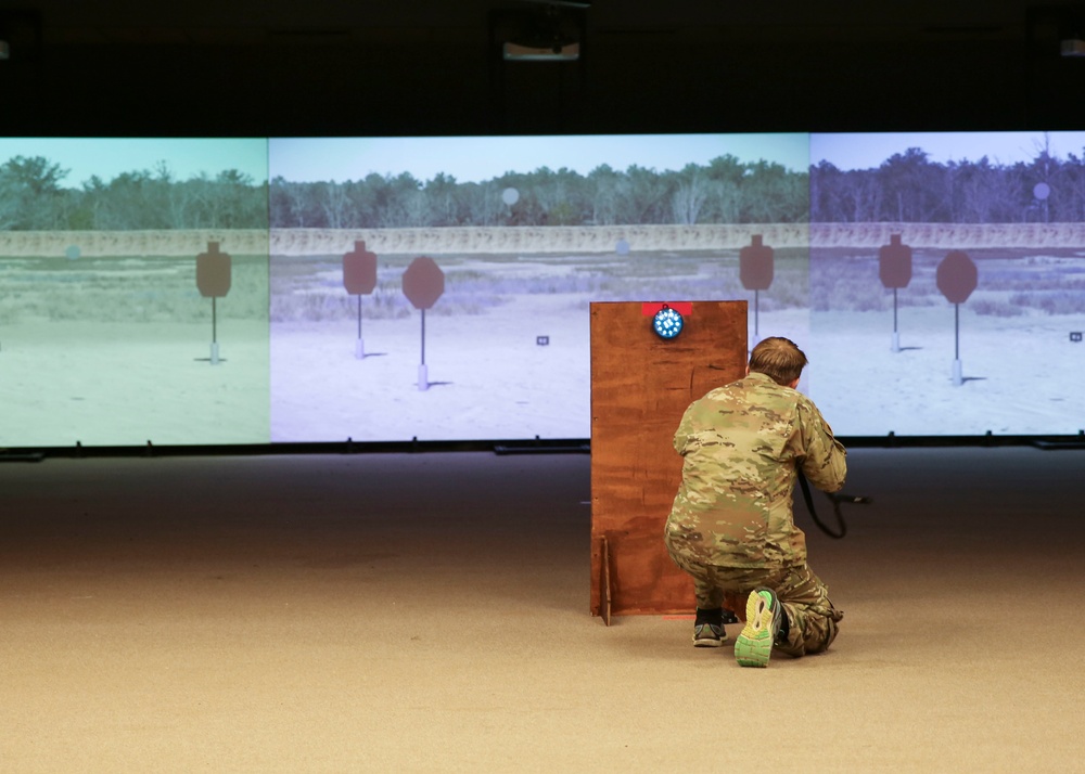 USAJFKSWCS Student uses virtual simulations through Squad Advanced Marksmanship Trainer