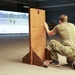 USAJFKSWCS Student uses virtual simulations through Squad Advanced Marksmanship Trainer