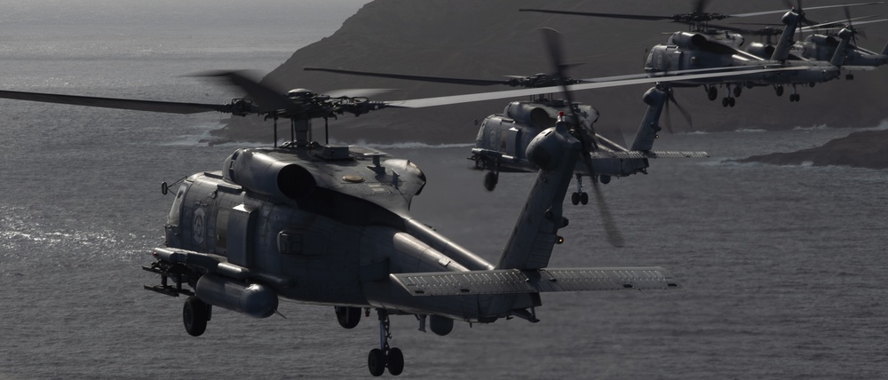 HSM 37 Helicopters Fly In Formation Around Oahu