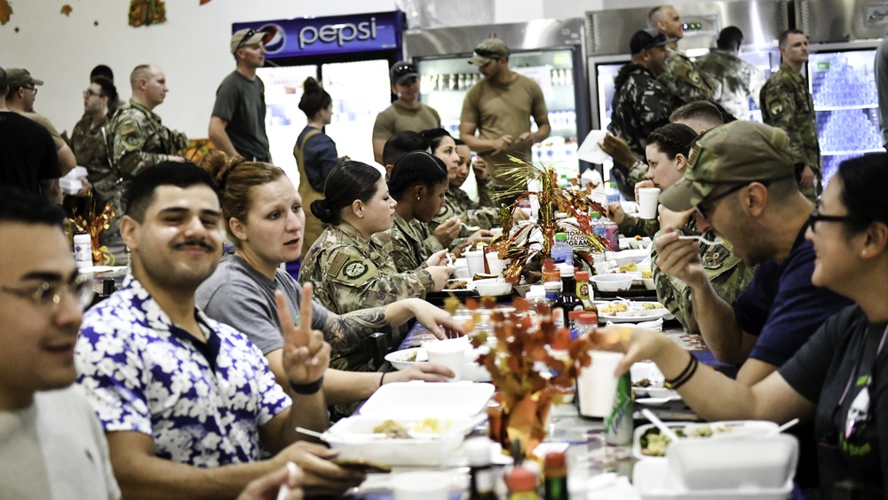 A Joint Thanksgiving: U.S. and Coalition forces share a holiday meal