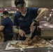 Deface Soldier Preps Meal