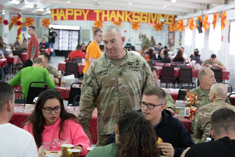 Command Sgt. Maj. Brian Hester greets troops on Thanksgiving