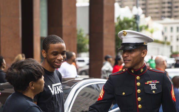 Marines walk in the Bayou Classic Parade