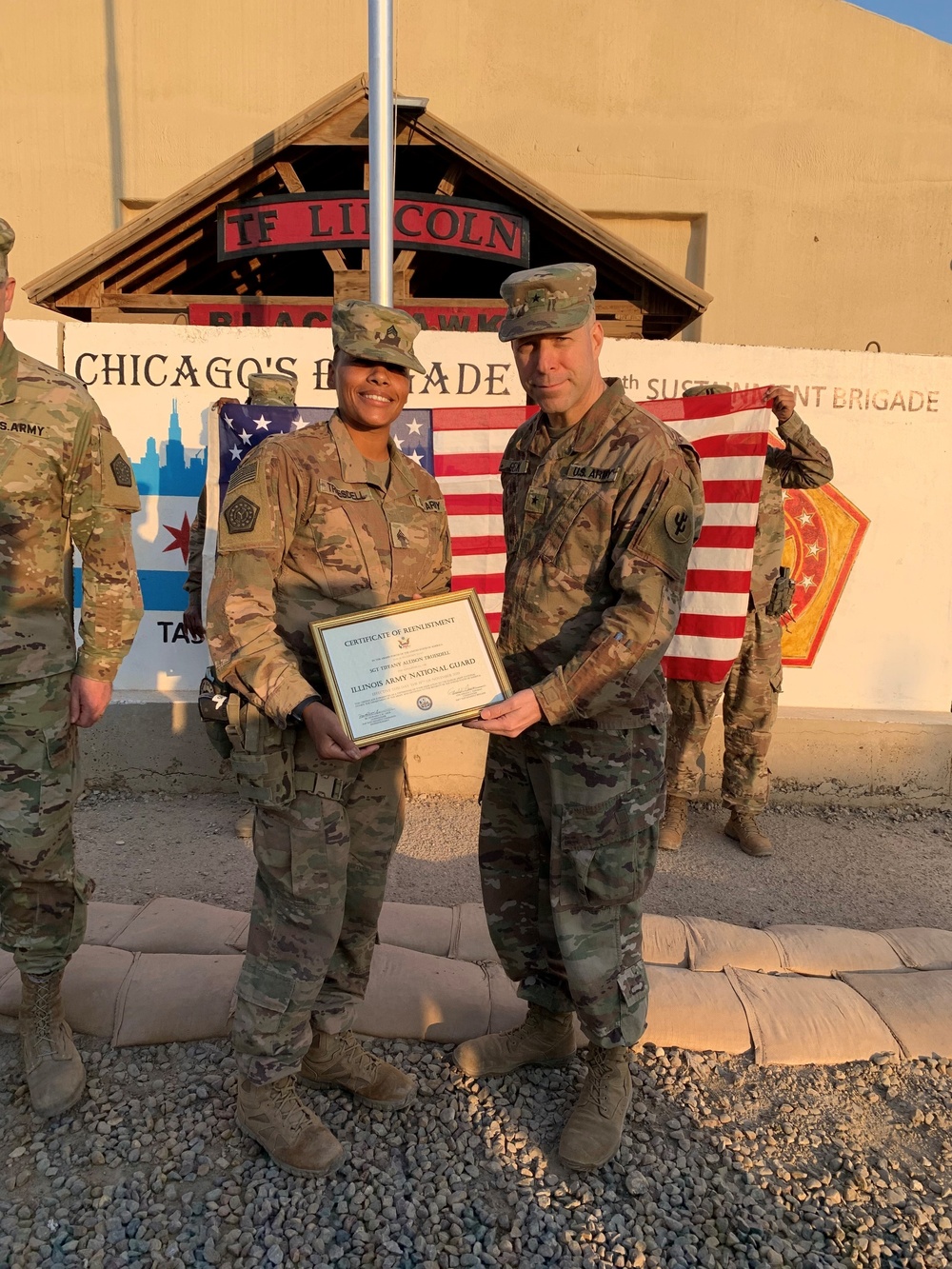 Illinois Army National Guard noncommissioned officer reenlists in Camp Taji, Iraq