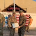 Illinois Army National Guard noncommissioned officer reenlists in Camp Taji, Iraq