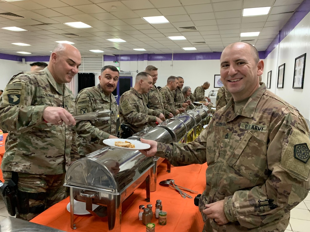 Deployed Illinois Army National Guard Soldiers celebrate Thanksgiving at Camp Taji, Iraq