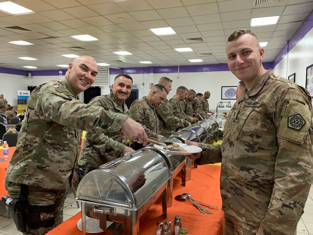 Deployed Illinois Army National Guard Soldiers celebrate Thanksgiving at Camp Taji, Iraq