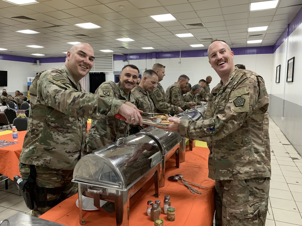 Deployed Illinois Army National Guard Soldiers celebrate Thanksgiving at Camp Taji, Iraq