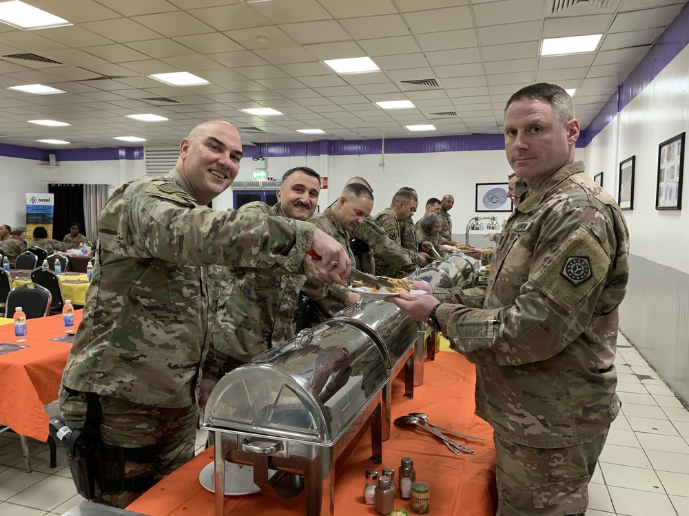 Deployed Illinois Army National Guard Soldiers celebrate Thanksgiving at Camp Taji, Iraq