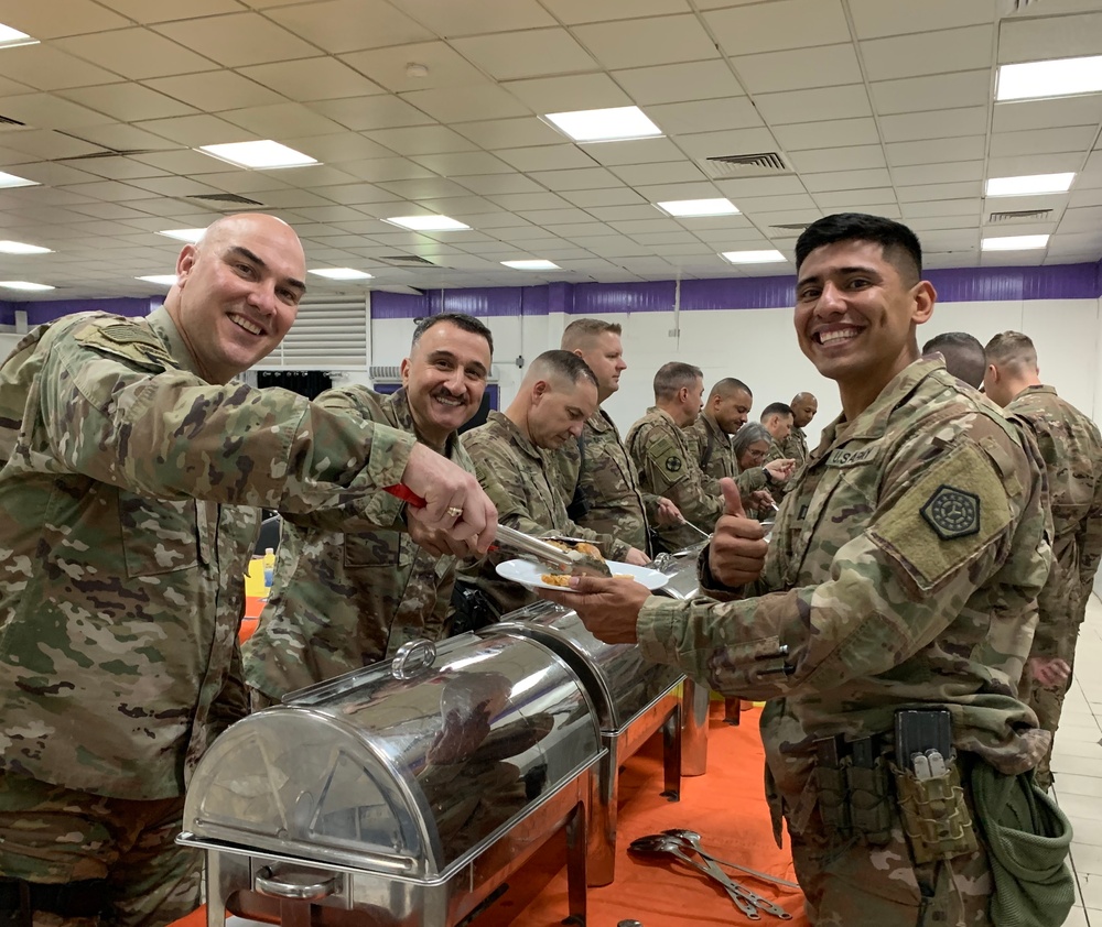 Deployed Illinois Army National Guard Soldiers celebrate Thanksgiving at Camp Taji, Iraq